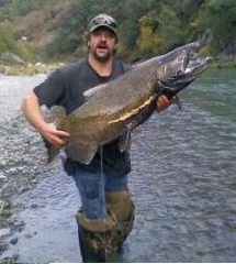 photo of man with fish